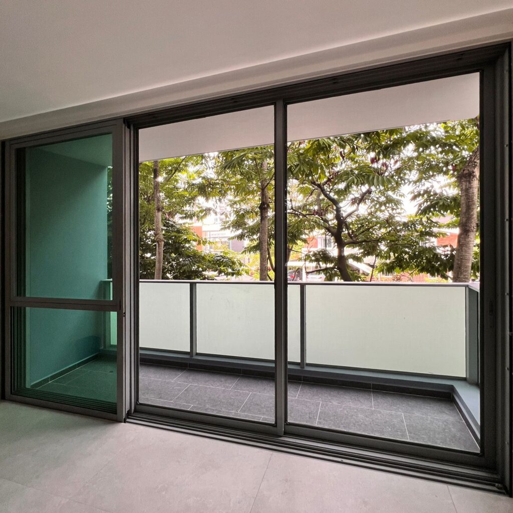 Insect mesh screen installed on a balcony with sliding doors