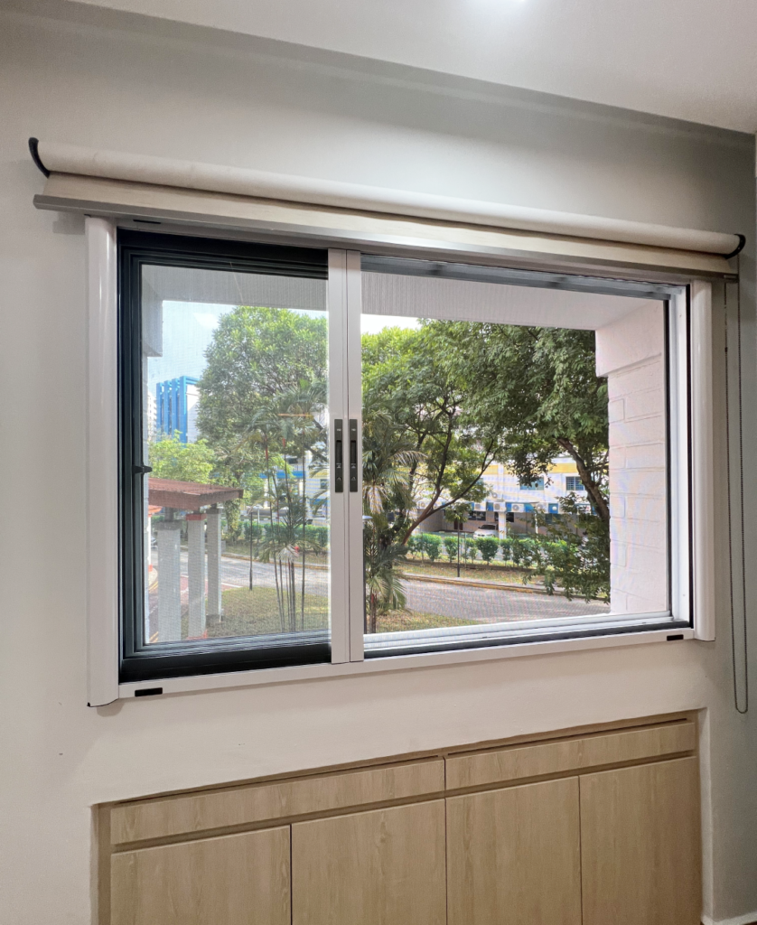 Retractable invisible cat mesh screen installed on sliding window for safe pet ventilation