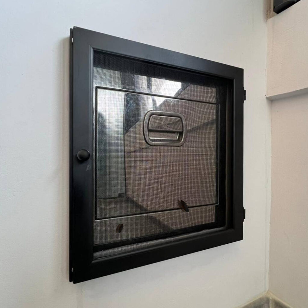 Insect mesh installed on rubbish chute to prevent cockroaches and other pests from entering the home.